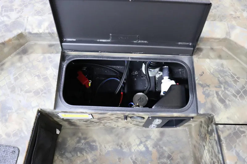 Slide: The Image of 2025 Excel 1751 Viper F4 boat storage compartment with wiring and components. - 13