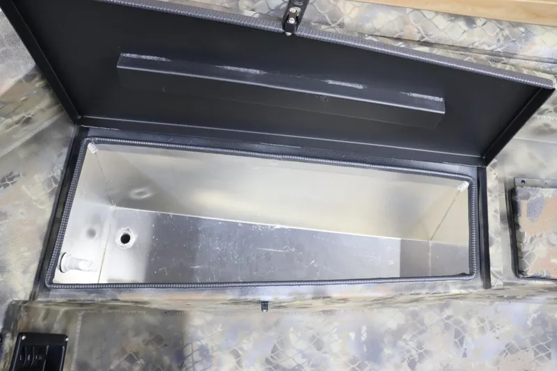 Slide: The Image of Open storage compartment of 2025 Excel 1751 Viper F4 boat. - 14