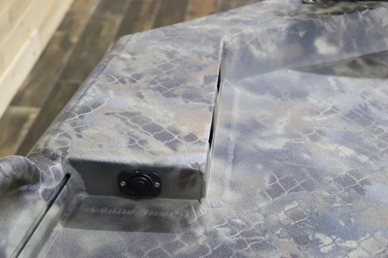 Slide: The Image of Close-up of 2025 Excel 1751 Viper F4 boat with camouflage pattern. - 18