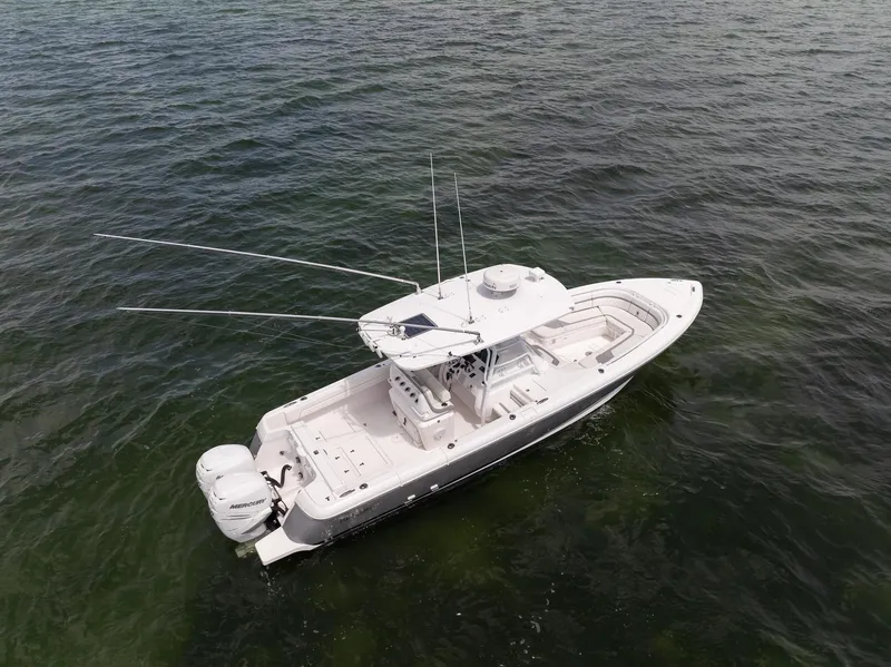 Slide: The Image of 2019 Intrepid 327 Center Console boat on open water. - 5