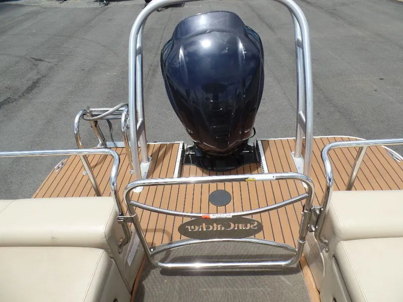 Slide: The Image of 2013 SunCatcher Elite 326 SS boat with outboard motor and teak deck. - 16