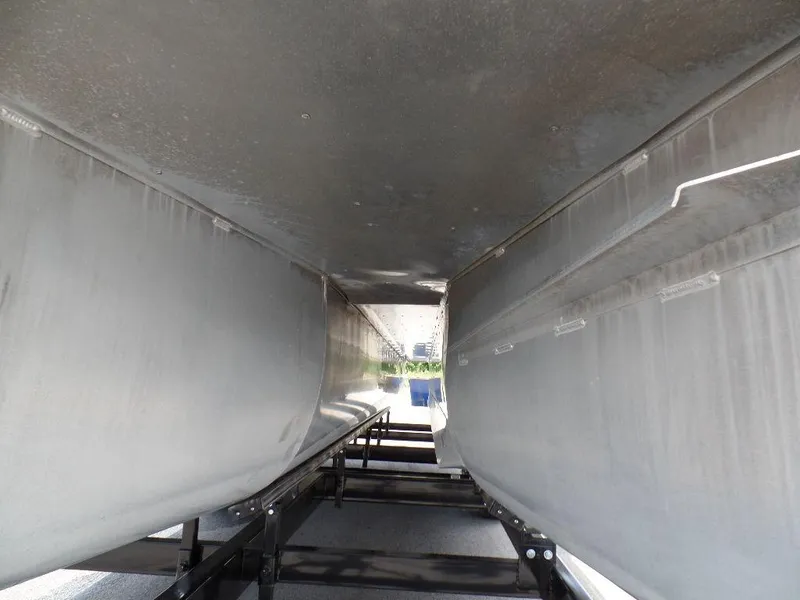 Slide: The Image of Underneath view of 2013 SunCatcher Elite 326 SS pontoon boat on trailer. - 23