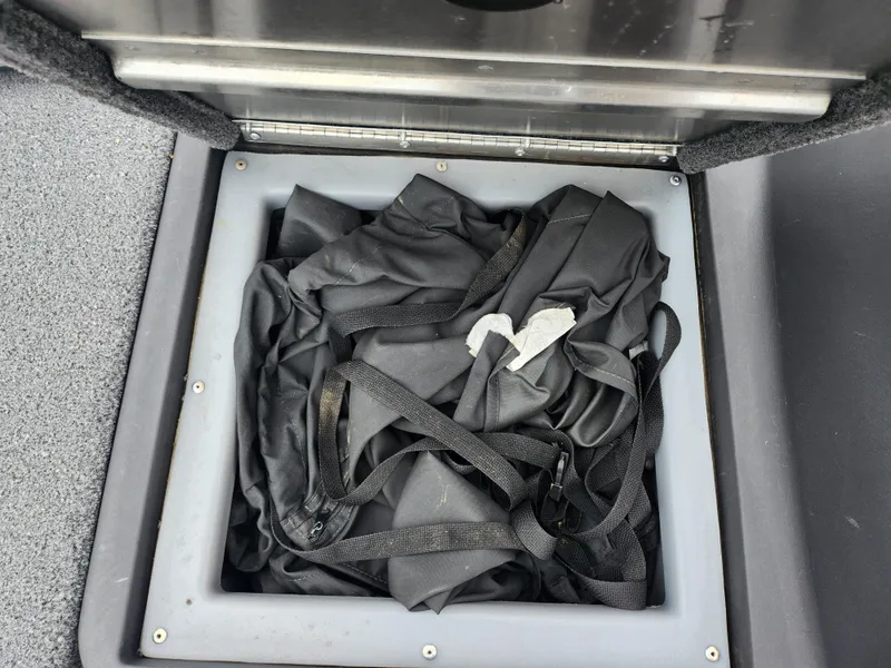 Slide: The Image of Storage compartment in 2021 Tracker Bass Tracker Classic XL boat. - 15