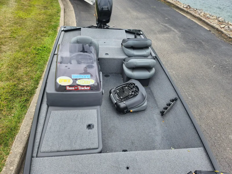 Slide: The Image of 2021 Tracker Bass Tracker Classic XL fishing boat with seating and storage compartments. - 18