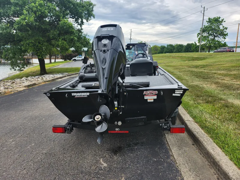 Slide: The Image of 2021 Tracker Bass Tracker Classic XL boat on a trailer, rear view. - 2