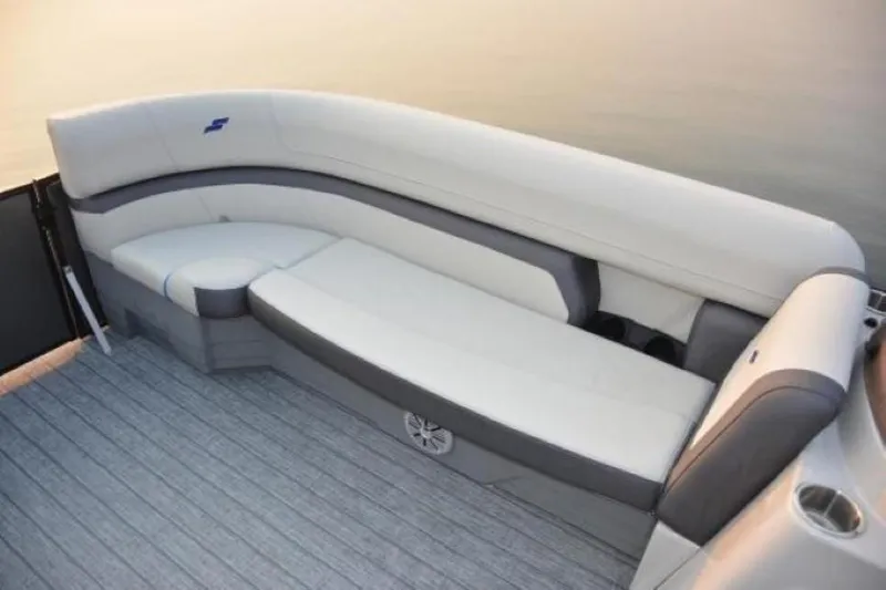 Slide: The Image of Luxurious seating on 2025 Starcraft EXS 1 boat, featuring sleek white and gray upholstery. - 19