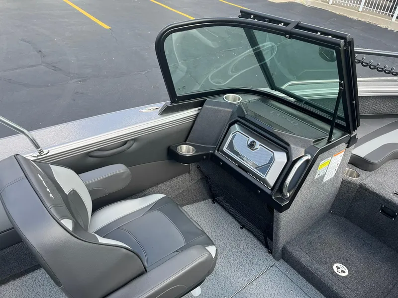 Slide: The Image of Interior of 2025 Lund 1975 Tyee boat with seating and dashboard. - 14