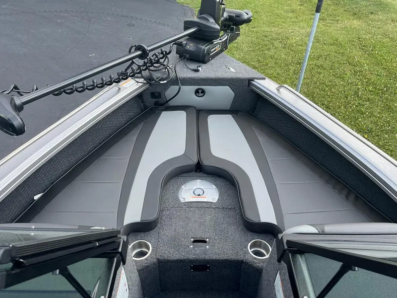 Slide: The Image of 2025 Lund 1975 Tyee boat interior with modern seating and fishing equipment. - 17