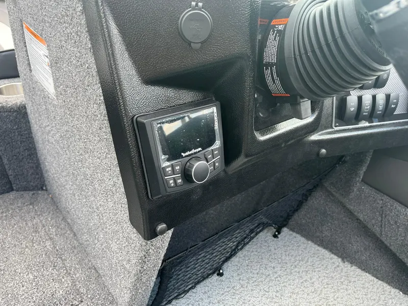 Slide: The Image of Control panel of a 2025 Lund 1975 Tyee boat with electronic display. - 21