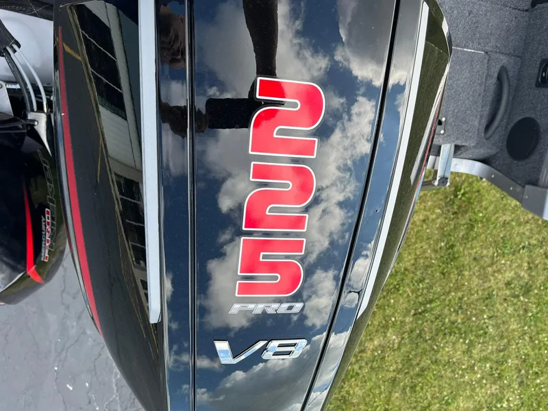 Slide: The Image of Close-up of a 2025 Lund 1975 Tyee boat's 225 Pro V8 engine. - 26