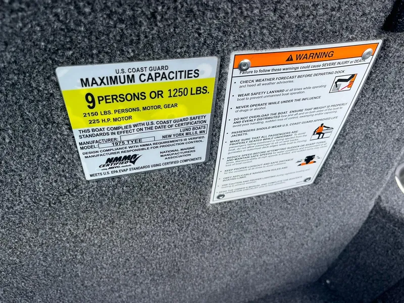 Slide: The Image of 2025 Lund 1975 Tyee boat capacity and safety warning labels. - 27