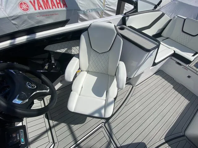 Slide: The Image of 2024 Yamaha Boats 252SD interior with white seating and modern design. - 13