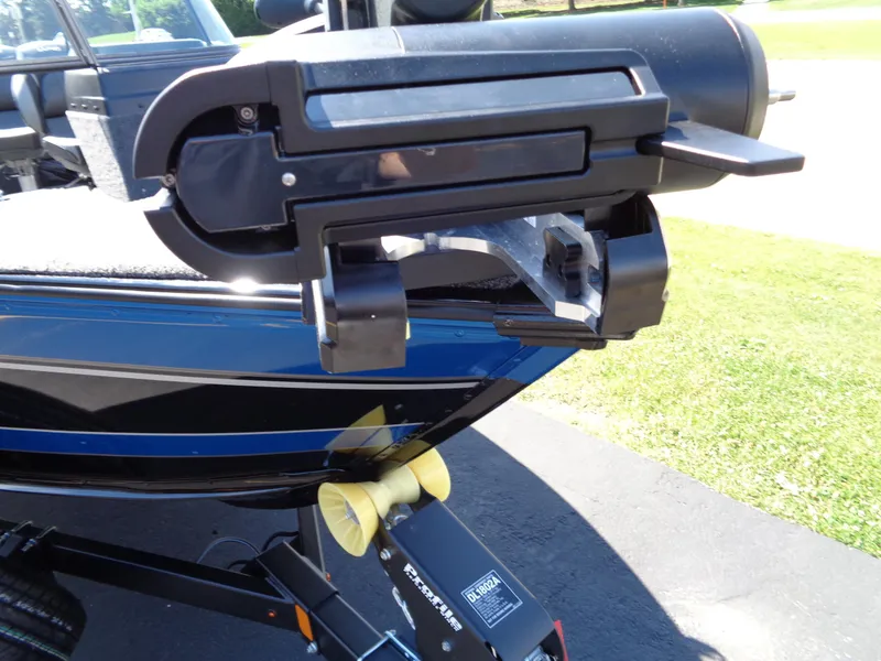 Slide: The Image of 2024 Lund 1875 Impact XS boat on trailer, close-up of bow and winch. - 15