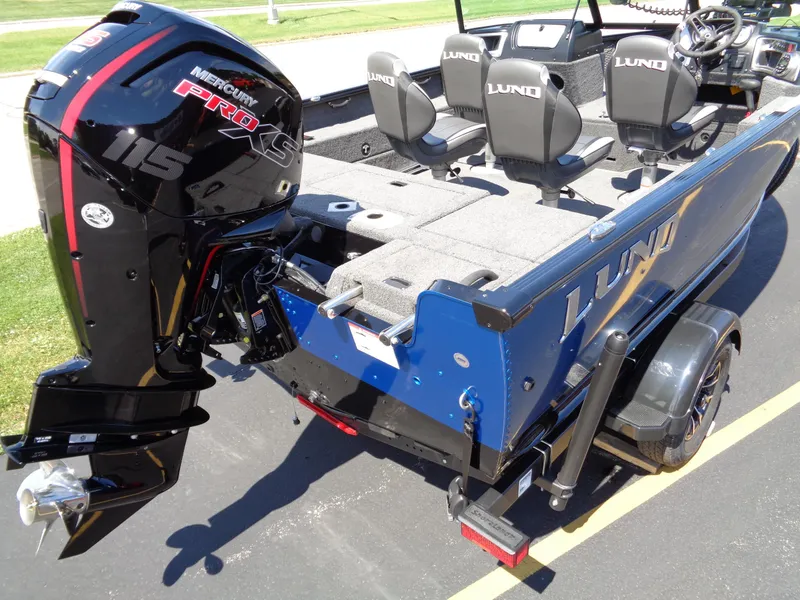 Slide: The Image of 2024 Lund 1875 Impact XS boat with Mercury Pro XS 115 outboard motor. - 5