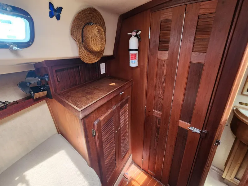 Slide: The Image of Control panel of a 1989 Island Packet 35 sailboat with gauges and ignition. - 39