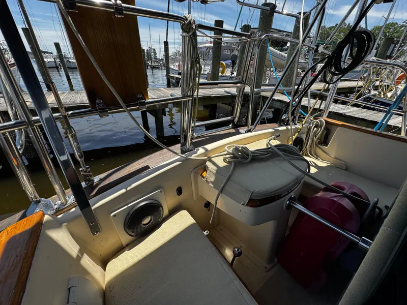 Slide: The Image of Deck of 1989 Island Packet 35 sailboat with ropes and fittings. - 42