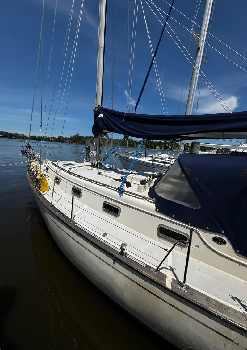 Slide: The Image of Bow of 1989 Island Packet 35 sailboat with anchor and ropes. - 43