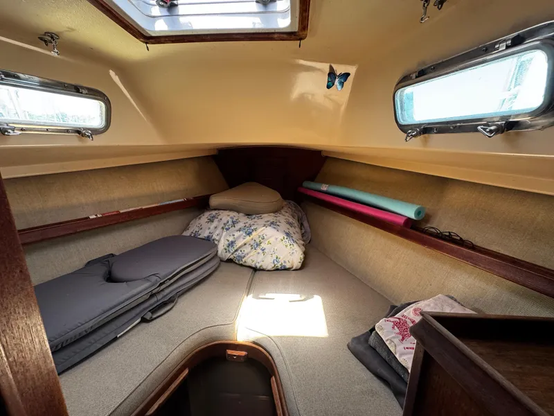 Slide: The Image of Sailboat cockpit with rope storage on 1989 Island Packet 35. - 51