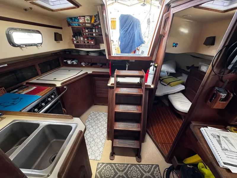 Slide: The Image of Vintage Seaward Princess stove in 1989 Island Packet 35 yacht interior. - 60