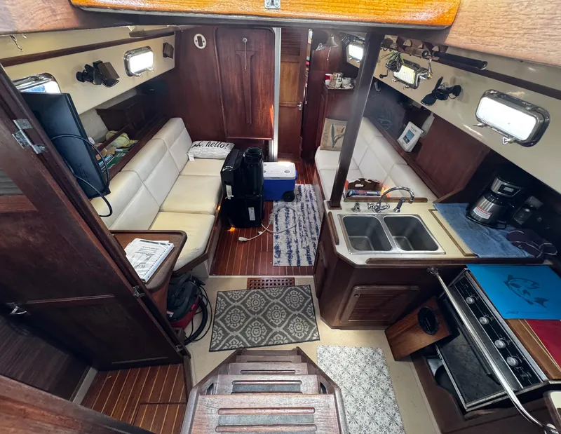 Slide: The Image of Interior of 1989 Island Packet 35 sailboat with navigation equipment and TV. - 62