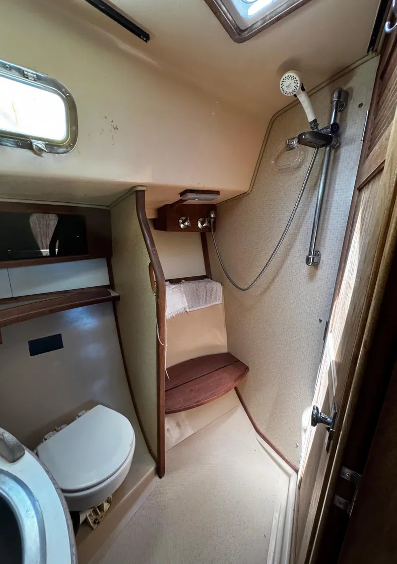 Slide: The Image of Control panel of a 1989 Island Packet 35 sailboat with Xantrex Freedom X inverter. - 66