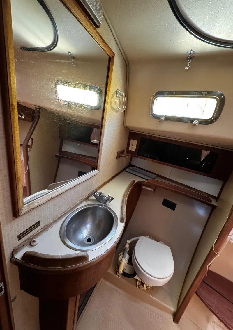 Slide: The Image of Control panel for wind and solar energy on 1989 Island Packet 35 sailboat. - 67