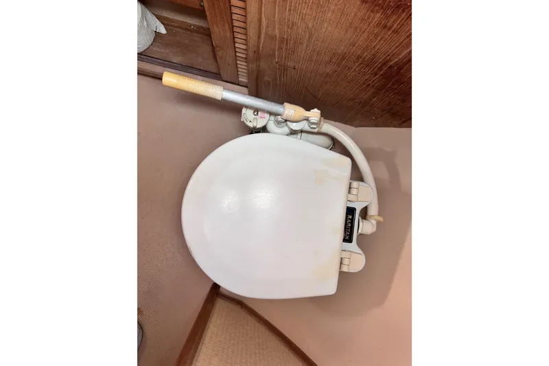 Slide: The Image of Marine toilet in 1989 Island Packet 35 sailboat bathroom. - 77