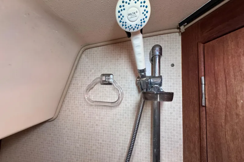 Slide: The Image of Shower area in 1989 Island Packet 35 sailboat with Delta showerhead. - 82
