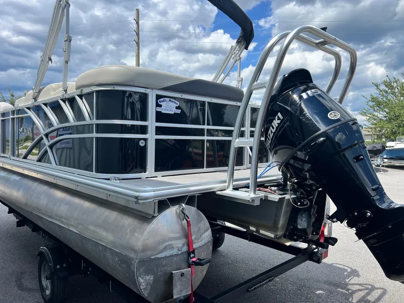 Slide: The Image of 2022 Sylvan Mirage 820 CRS C pontoon boat with Suzuki outboard motor. - 11