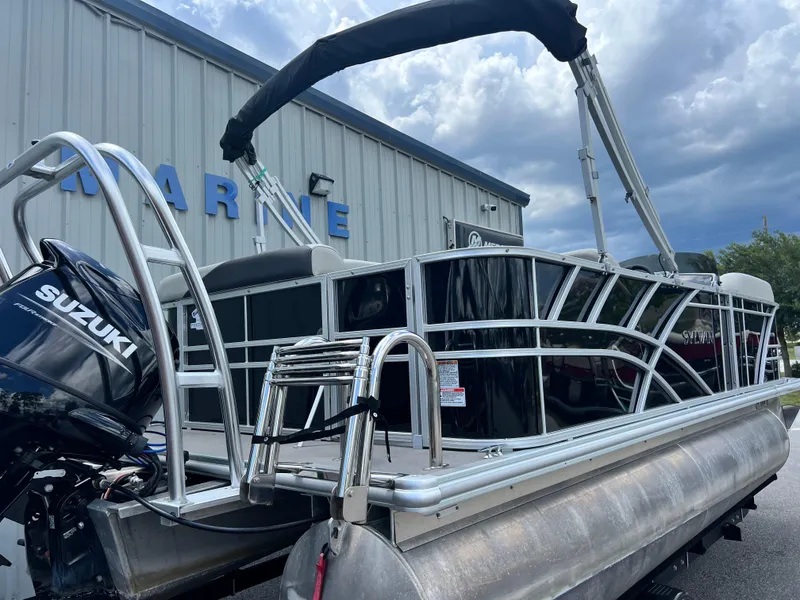 Slide: The Image of 2022 Sylvan Mirage 820 CRS C pontoon boat with Suzuki outboard motor. - 13