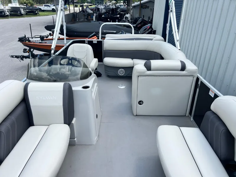 Slide: The Image of 2022 Sylvan Mirage 820 CRS C pontoon boat with spacious seating and modern design. - 4