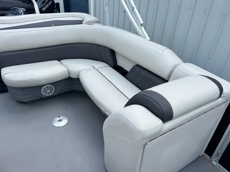 Slide: The Image of 2022 Sylvan Mirage 820 CRS C boat with white and gray seating. - 8