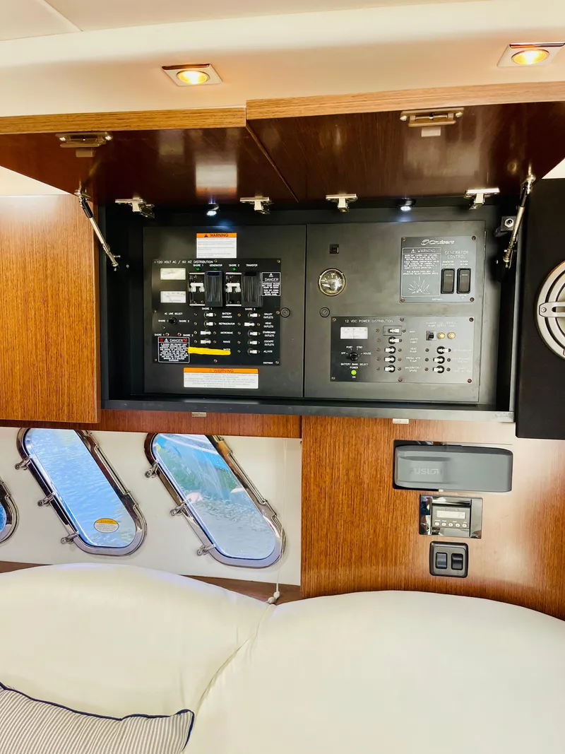 Slide: The Image of Electrical control panel inside a 2012 Cruisers 350 Express yacht. - 35