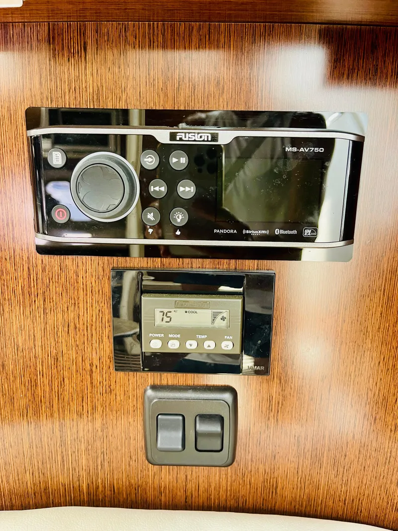 Slide: The Image of Fusion MS-AV750 stereo system and control panel in a 2012 Cruisers 350 Express boat. - 42