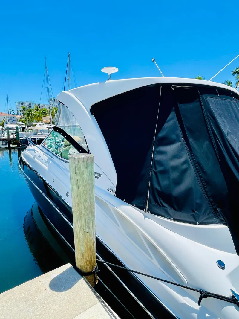 Slide: The Image of 2012 Cruisers 350 Express yacht docked at marina. - 7