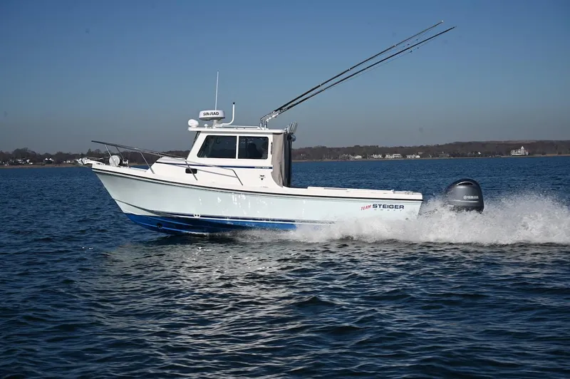 The Image of 2025 Steiger Craft 255 Miami boat cruising on open water. - 1