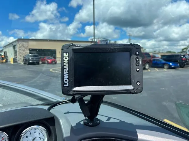 Slide: The Image of Lowrance fish finder on a 2017 Lund Impact XS 1850 boat dashboard. - 23