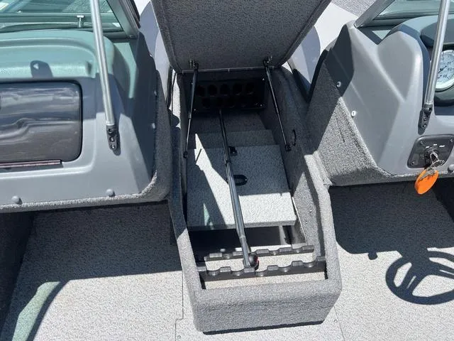 Slide: The Image of 2017 Lund Impact XS 1850 boat interior storage compartment. - 25