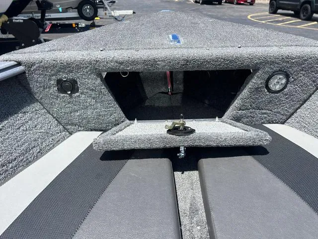 Slide: The Image of 2017 Lund Impact XS 1850 boat interior with storage compartment open. - 29