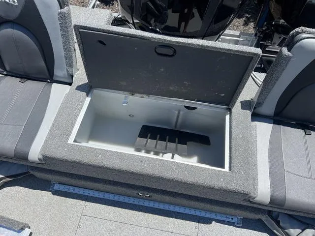 Slide: The Image of 2017 Lund Impact XS 1850 boat with open storage compartment. - 9