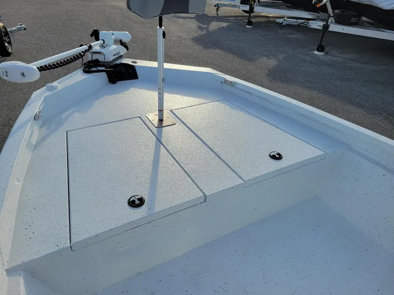 Slide: The Image of 2025 Xpress H190 Bay Boat deck with storage compartments and trolling motor. - 3