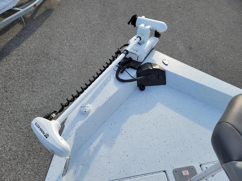 Slide: The Image of 2025 Xpress H190 Bay Boat with Minn Kota trolling motor on deck. - 4
