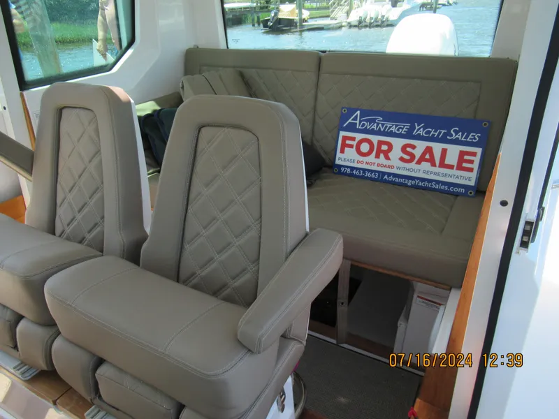 Slide: The Image of Interior of 2018 Axopar Mark II boat with "For Sale" sign. - 27