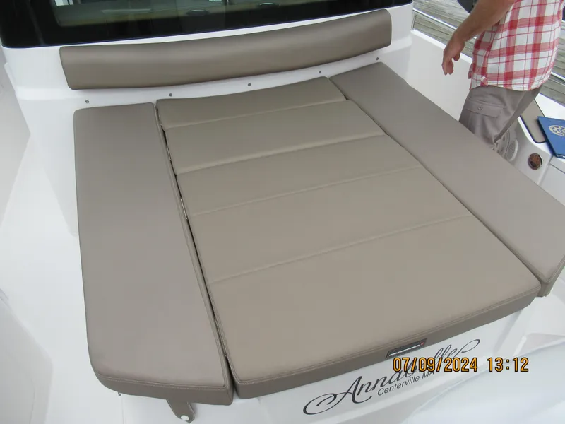 Slide: The Image of Axopar Mark II 2018 boat with beige cushioned seating area. - 30