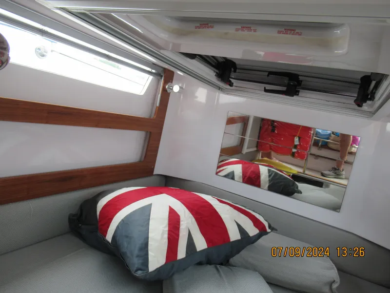 Slide: The Image of Interior of 2018 Axopar Mark II boat with Union Jack pillow and modern design. - 35