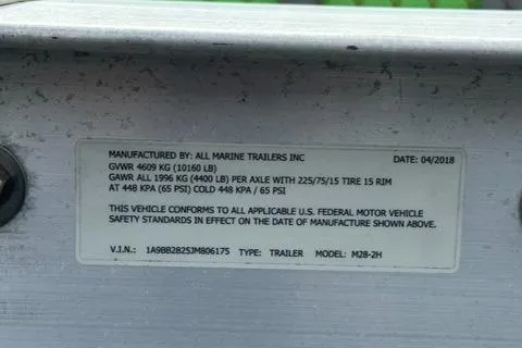 Slide: The Image of 2018 Axopar Mark II trailer label with specifications and safety standards. - 8