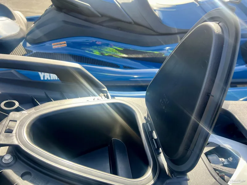 Slide: The Image of 2025 Yamaha WaveRunner VX Cruiser HO storage compartment open, showcasing interior details. - 8
