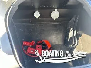 Slide: The Image of 2024 Yamaha WaveRunner VX Cruiser storage compartment with safety equipment at Boating Lake Mead. - 10