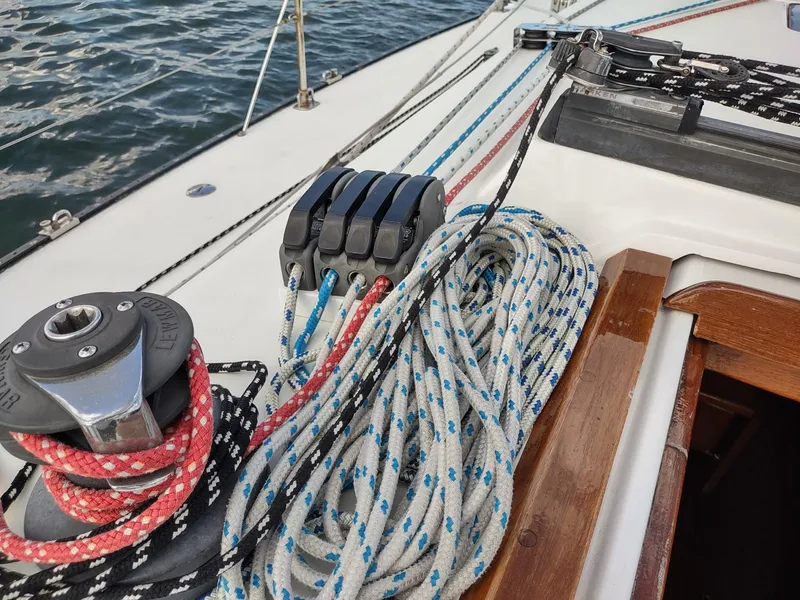 Slide: The Image of Close-up of sailing ropes and winch on 1983 Islander 40 sailboat deck. - 16