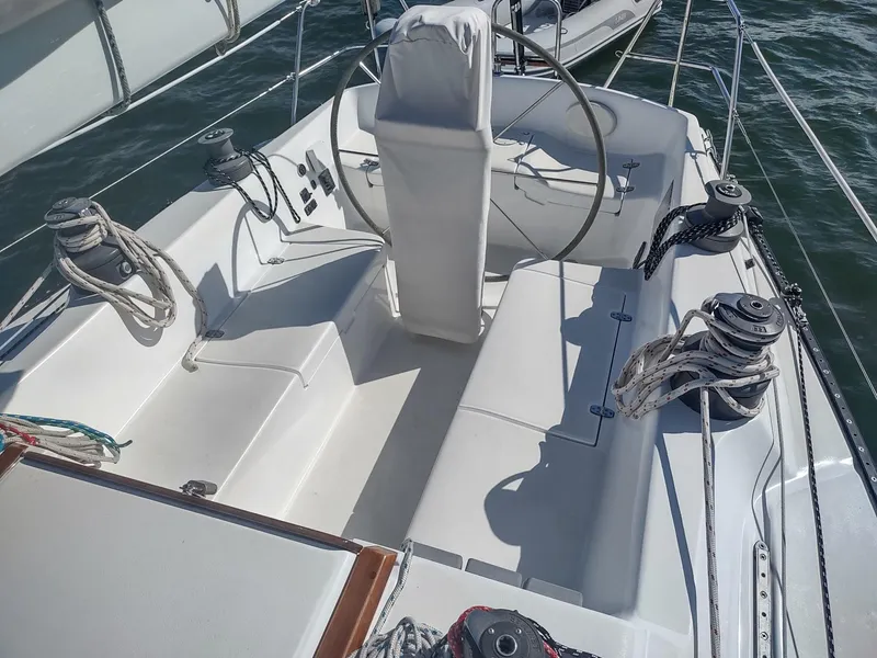 Slide: The Image of Cockpit of 1983 Islander 40 sailboat with steering wheel and winches. - 17